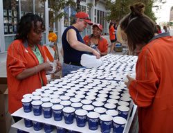 Marathon volunteers at water tables