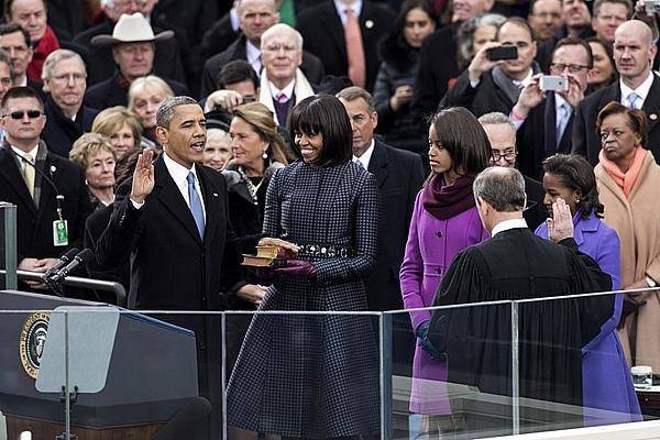 President Barack Obama's second swearing in three village trustees