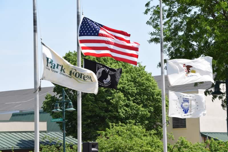 Expect more property tax pain. Memorial Day, flags, half-staff, Village Green