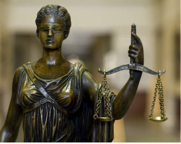 financial adviser sentenced, Lady Justice, blindfolded justice