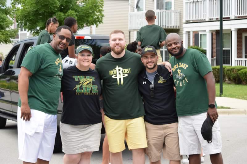 Dr. Albert Brass Jr. and faculty and staff from Rich East on July 4, 2019