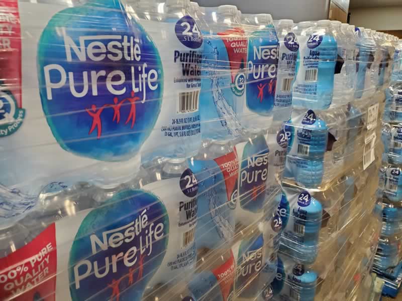 Bottled, donated water at Faith Movers Church in University Park