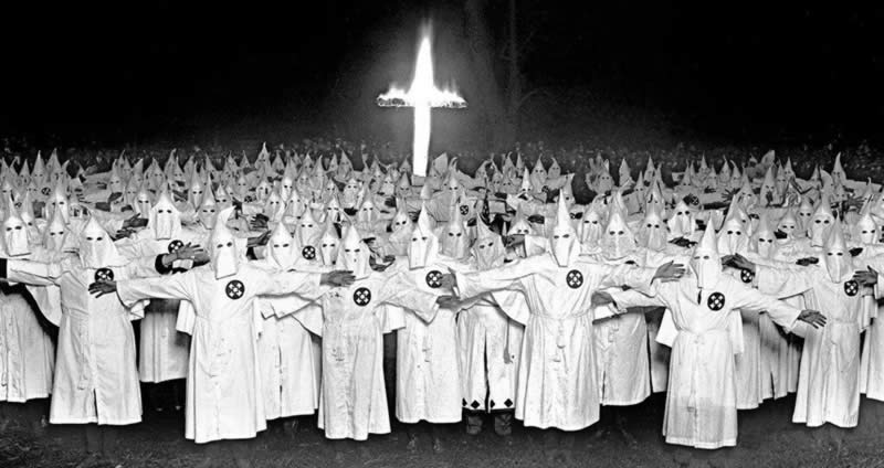 Cross burning at white supramacy Klu Klux Klan rally