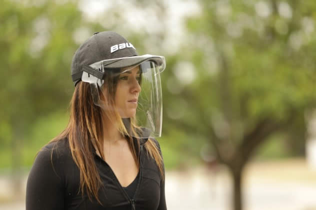 The Bauer Integrated Cap Shield attaches to the brim of a baseball hat or can be worn separately. It is designed to provide protection that stretches from the forehead to chin, offering important eye, nose and mouth splash coverage. (Photo/Bauer)