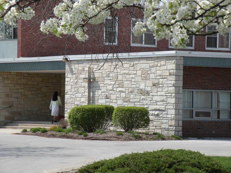 Sr. Mary Jo Sobieck, O.P. enters the convent at Marian Catholic High School on a spring afternoon. (Photo: Kevin Kelly)