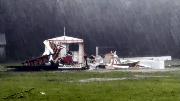 Several homes were damaged near Pensacola, Florida, on Saturday morning as Claudette moved inland.