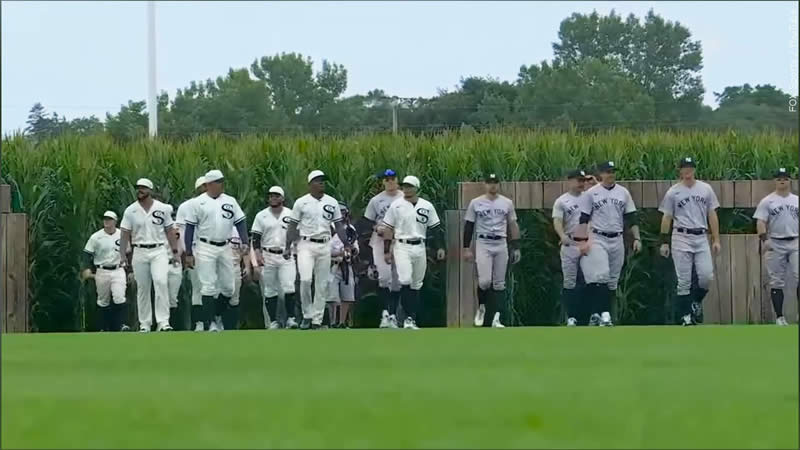 Kevin Costner leads New York Yankees and Chicago White Sox from cornfield onto the Field of Dreams, Photo Date: Aug 12, 2021