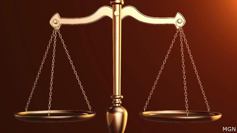scales of justice, sentenced for firearm offense