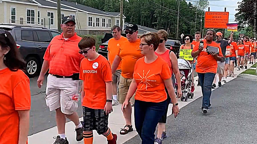 Protesters wearing orange for gun violence awareness