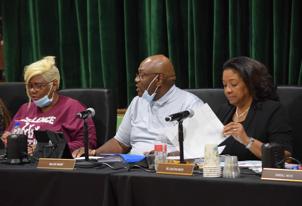 Board Member Judy Hawthorne, Board President Walter Mosby, and Superintendent Caletha White at Monday's board meeting.