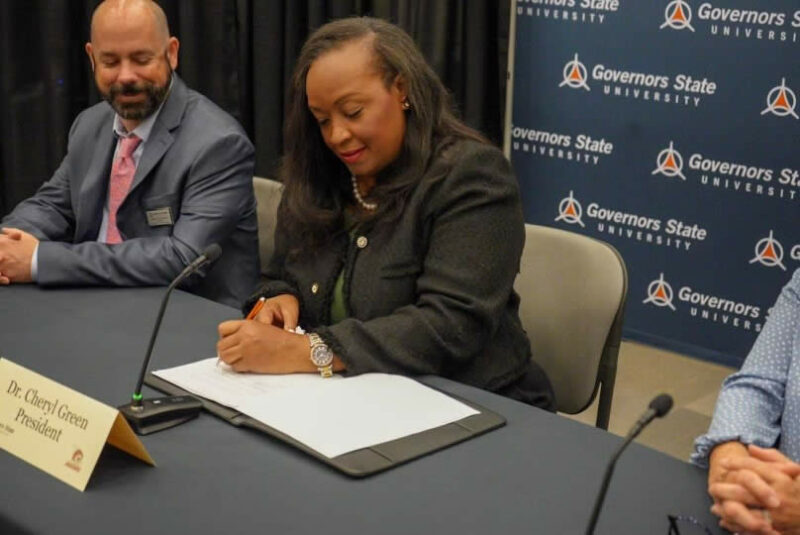 GSU President Cheryl Green signs the SIU agreement