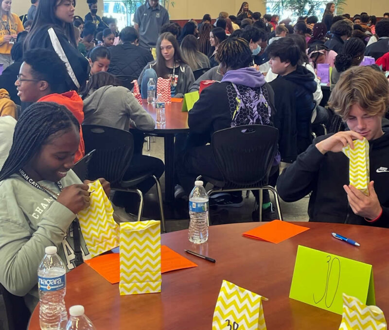 Sophomores at Marian Catholic High School participate in a retreat Wednesday
