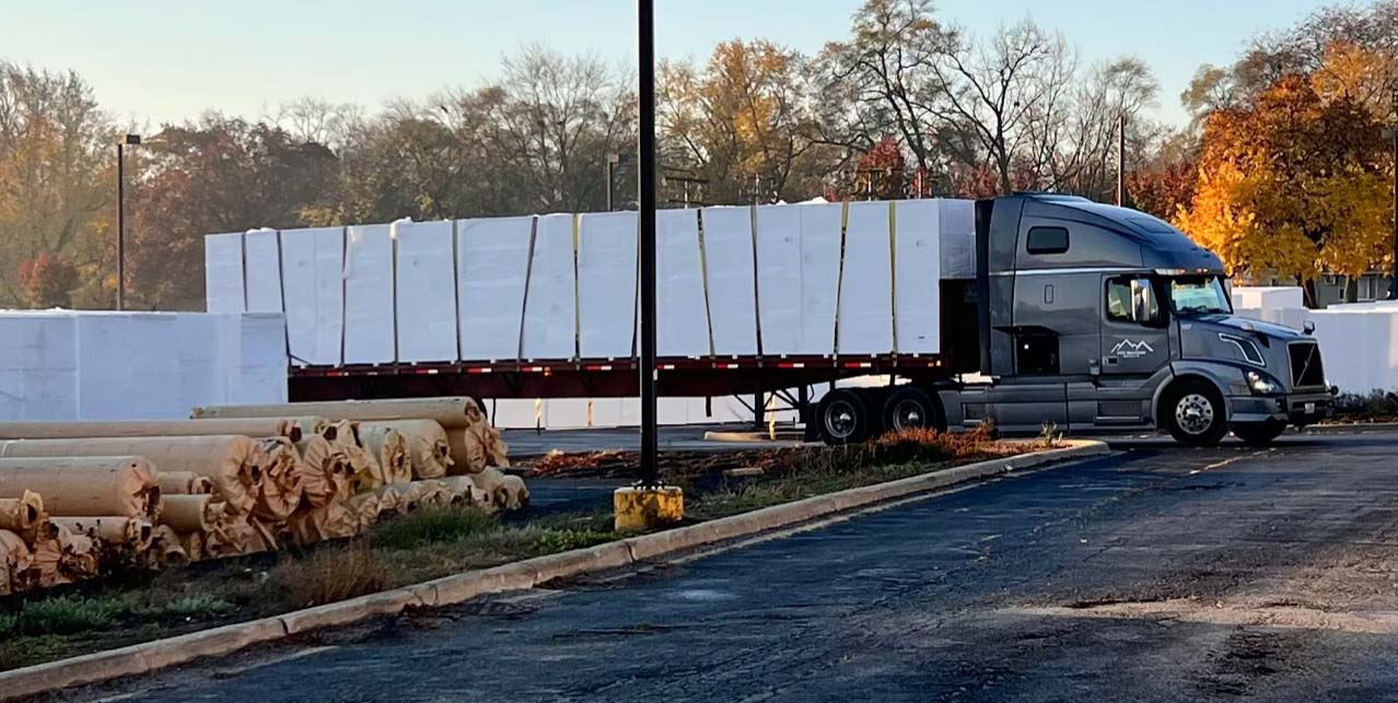 semitruck loaded with white foam
