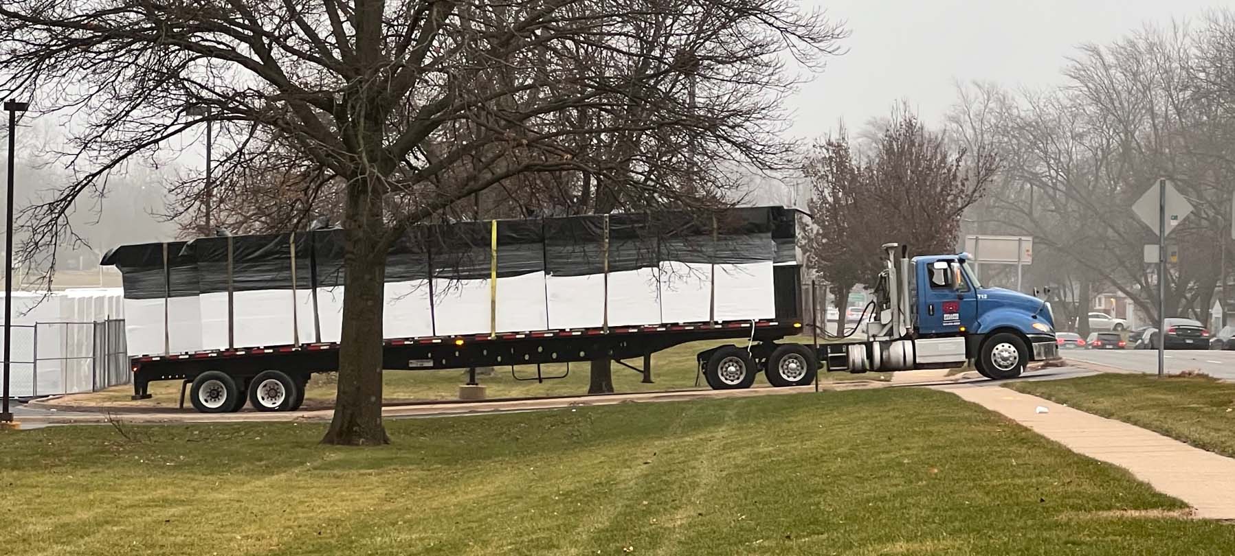 flatbed truck loaded with material