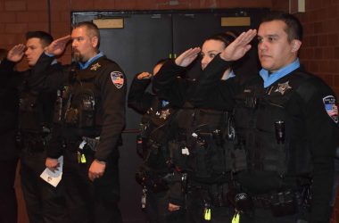 Officers stand at attention at a February 2020 ceremony at Freedom Hall