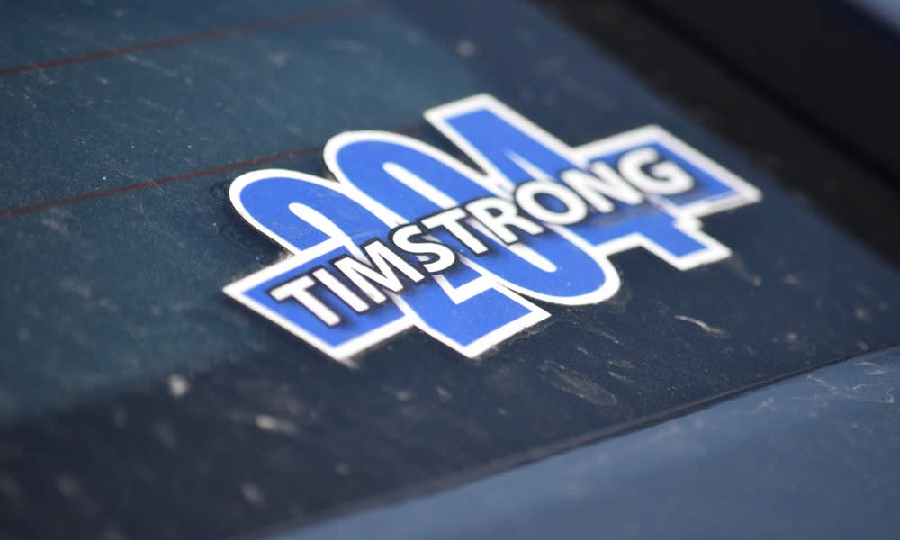 A sticker on the rear window of a car honoring Officer Tim Jones badge number 204. (Photo: Gary Kopycinski)