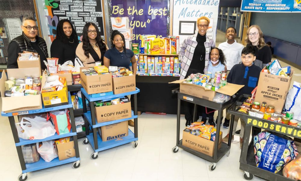 Students from Aubrey Schuh’s class celebrated the 100th day of school by helping in a schoolwide effort to donate food items to the Rich Township Food Pantry. From left, Rich Township Supervisor Calvin Jordan, classroom assistant Lekeyia Collins, assistant principal Christina King, Ayanna Seamone, principal Tracye Hustona, Kamille Williams, Ronald Dangerfield, Randy Solis and teacher Aubrey Schuh.