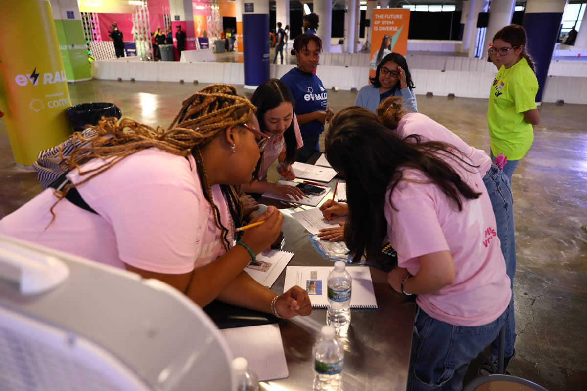 Cherish Meyers, front-left, works with young women at Build Night. (PHOTO SUPPLIED)