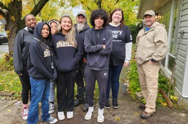 Habitat for Humanity workers and Marian Catholic students team up for a Day of Service.