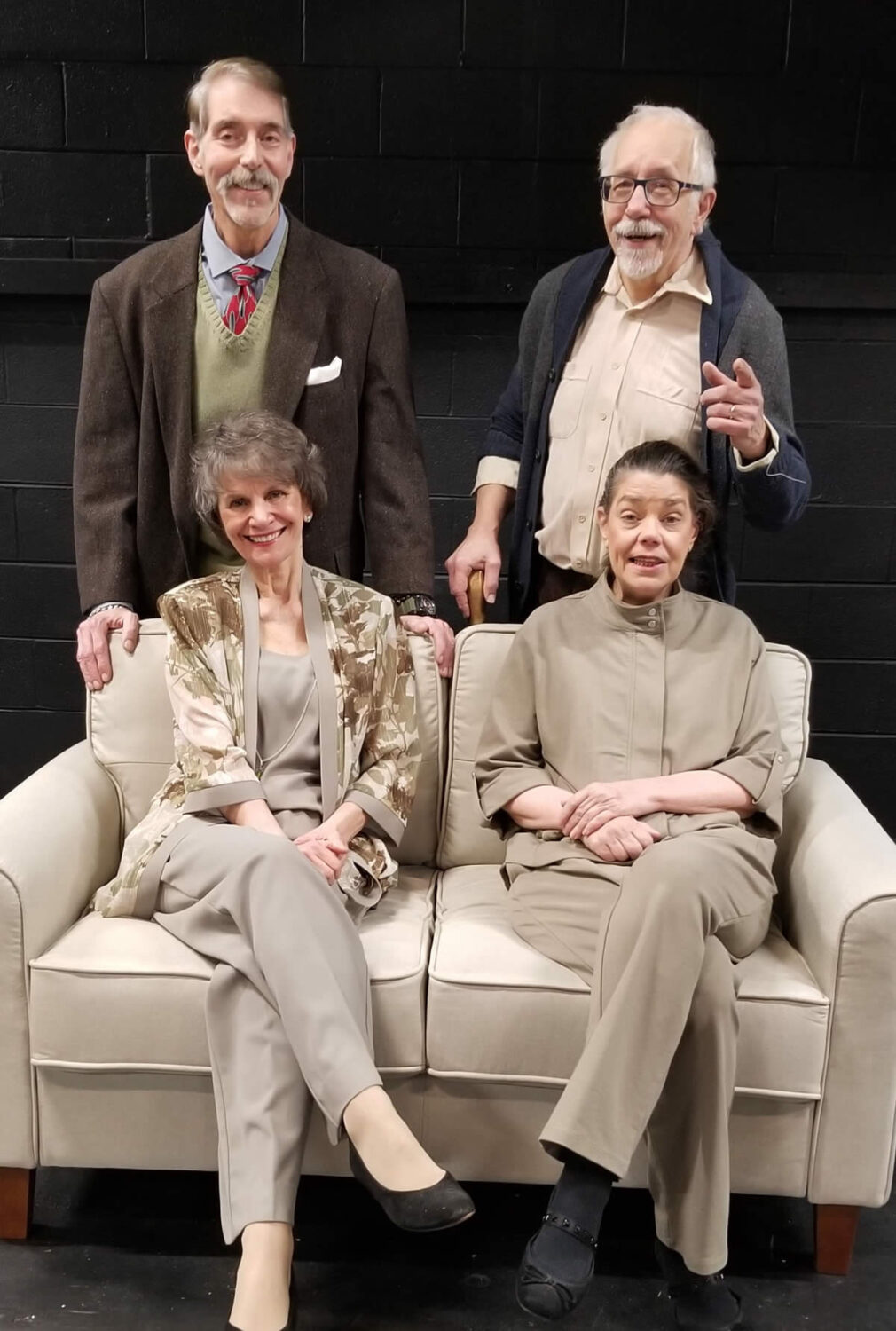 (L to R) Reggie (Mike Cabsinger) and Wilf (Ken Hawkley) stand behind (L to R) Jean (Liliana Mitchell) and Cissy (Alicia Cuccia) in this group photo of the cast of Quartet. The comedy Quartet runs at The Drama Group from April 12 to 21.