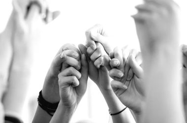 Black Millennial Renaissance fellowship, hands reaching