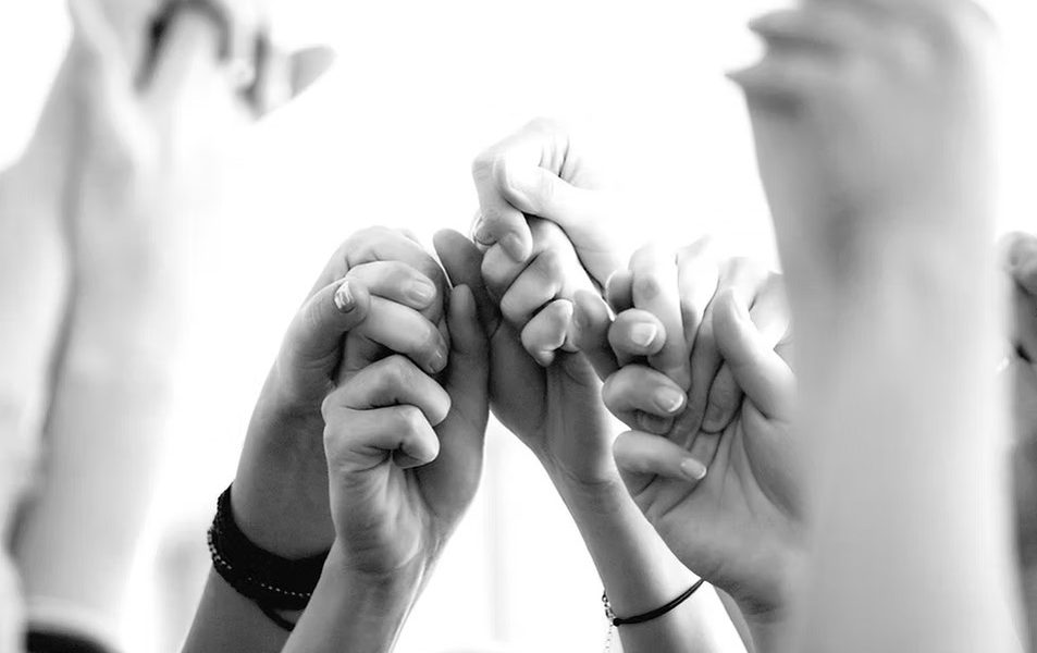 Black Millennial Renaissance fellowship, hands reaching