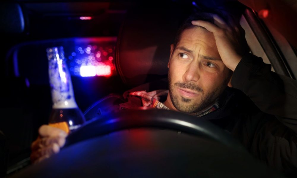 impaired driving, police stopping drunk driver