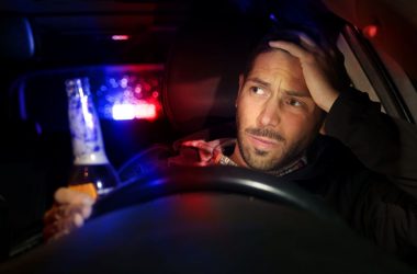 impaired driving, police stopping drunk driver